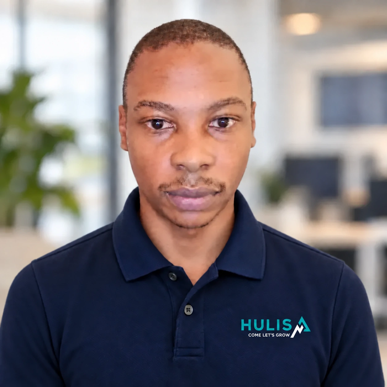 Frans Mokgapa wearing a navy Hulisa polo