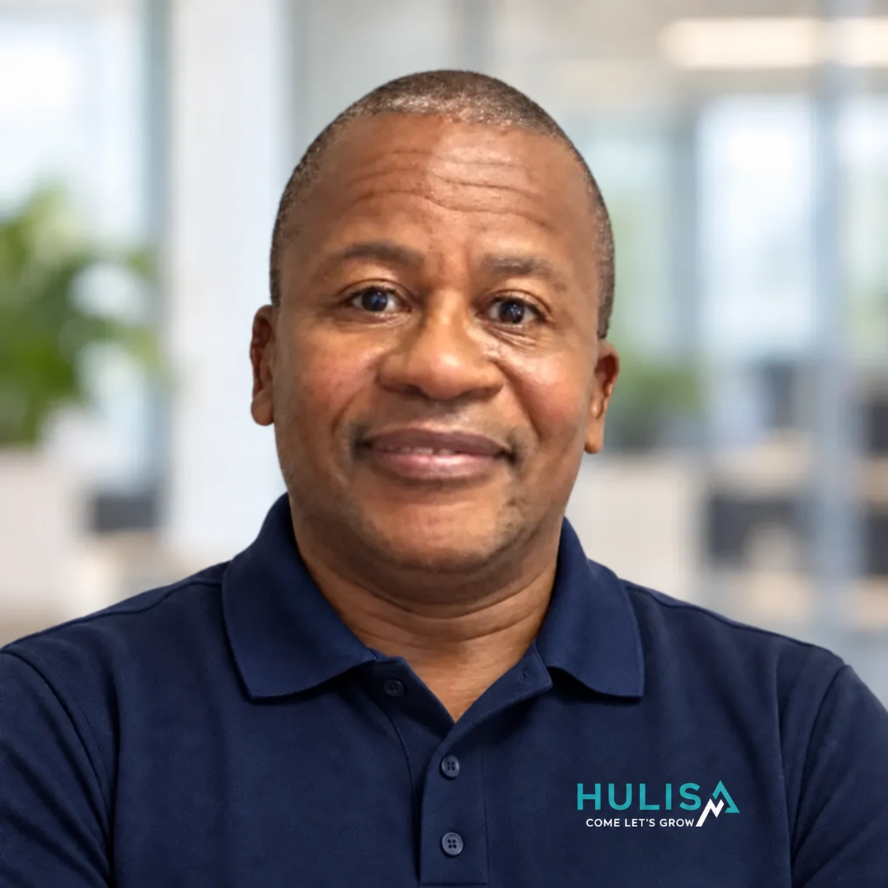 Wilson Mafokwana wearing a navy Hulisa polo
