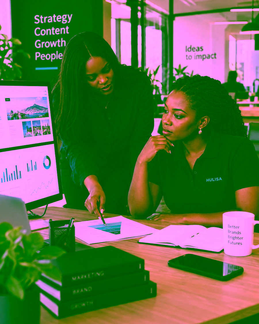 Hulisa growth strategists in branded clothing reviewing digital performance